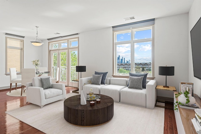 7400 River Rd Unit 304, North Bergen, NJ 07047 - living room with wood finished floors and healthy amount of natural light