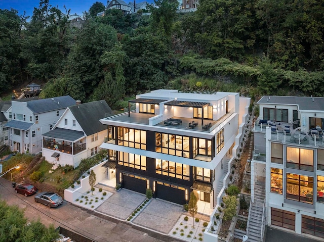 rear view of house with a balcony