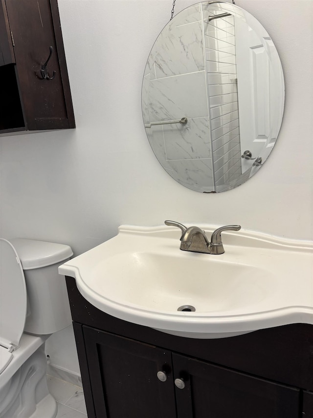 90 Ralph St Unit 3, Belleville, NJ 07109 - half bath with vanity, toilet, and marble finish flooring