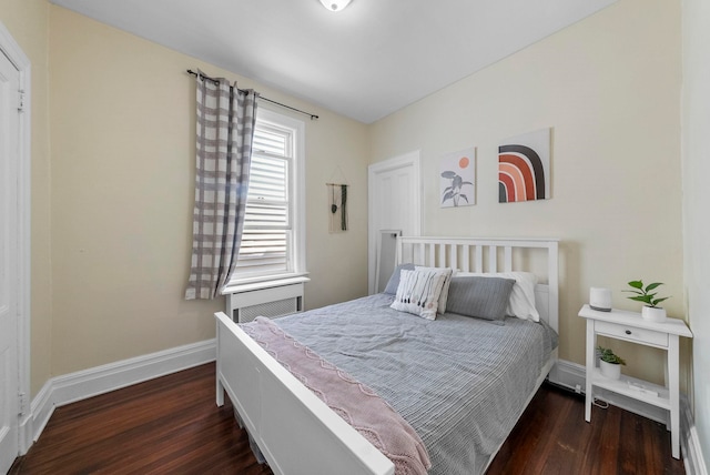 57 Booraem Ave, Jersey City, NJ 07307 - bedroom featuring dark wood-type flooring and baseboards