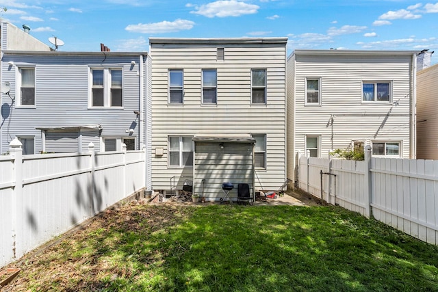 57 Booraem Ave, Jersey City, NJ 07307 - rear view of property featuring a fenced backyard