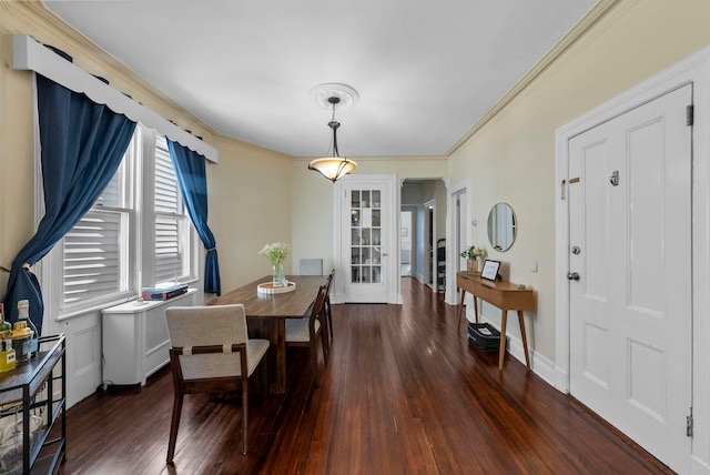 57 Booraem Ave, Jersey City, NJ 07307 - dining area featuring wood finished floors, arched walkways, and ornamental molding