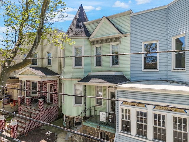 57 Booraem Ave, Jersey City, NJ 07307 - view of front of home with a shingled roof