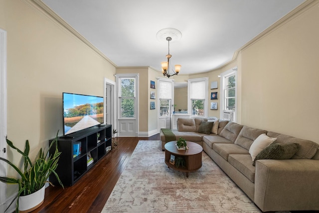57 Booraem Ave, Jersey City, NJ 07307 - living area with wood-type flooring, healthy amount of natural light, a chandelier, and crown molding
