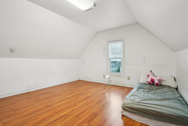 442 Avenue E Ave E, Bayonne, NJ 07002 - bedroom featuring light wood-style flooring, vaulted ceiling, and baseboards