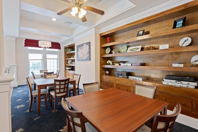 dining room with built in features, beam ceiling, visible vents, dark carpet, and ceiling fan with notable chandelier