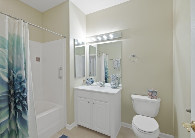 full bathroom with shower / tub combo with curtain, toilet, vanity, baseboards, and tile patterned floors