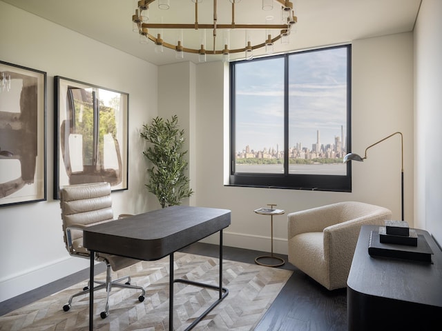 office with plenty of natural light and dark wood-type flooring