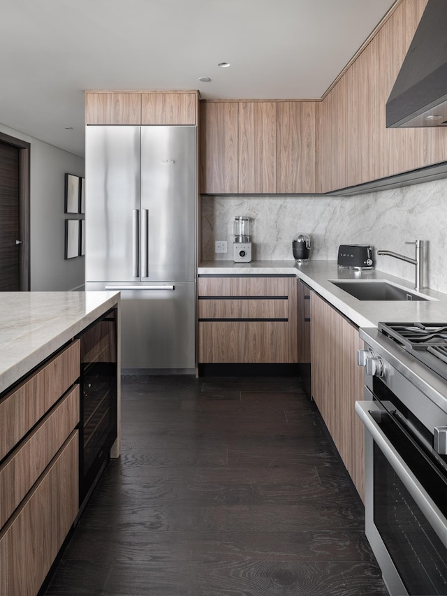 kitchen with sink, wine cooler, range hood, decorative backsplash, and appliances with stainless steel finishes