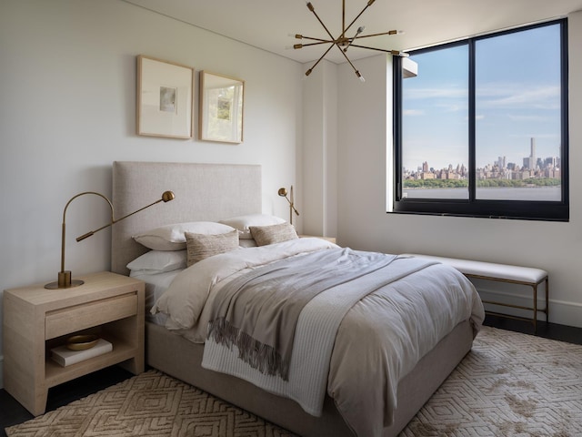 bedroom with a notable chandelier