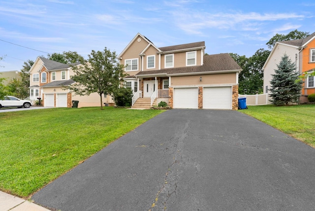 view of front facade with a garage and a front lawn