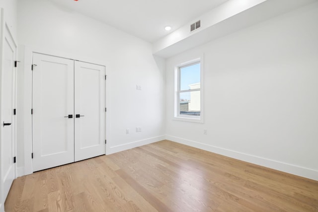 9 Pierce Ave Unit 2, Jersey City, NJ 07307 - unfurnished bedroom featuring light wood-type flooring and a closet