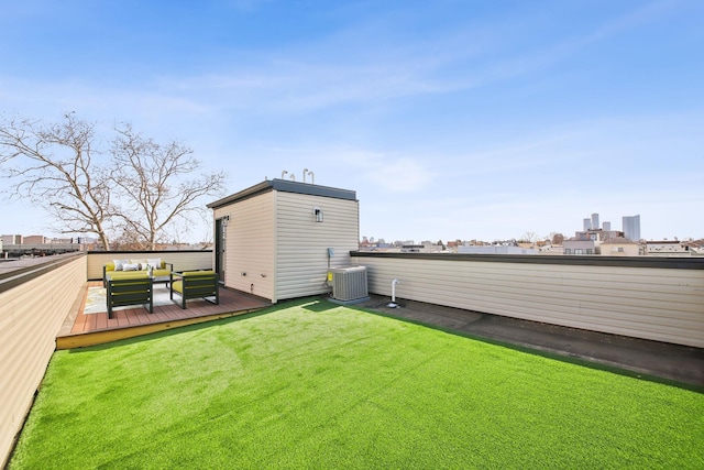 9 Pierce Ave Unit 2, Jersey City, NJ 07307 - view of grassy yard with a deck and an outdoor living space