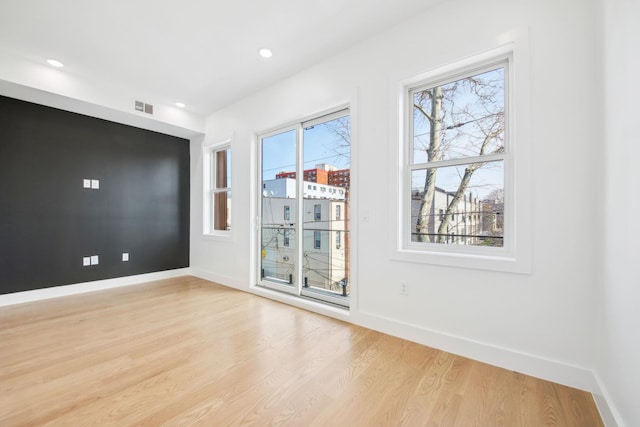 9 Pierce Ave Unit 2, Jersey City, NJ 07307 - spare room featuring light wood-style flooring and recessed lighting