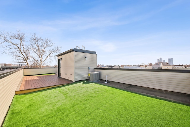 9 Pierce Ave Unit 2, Jersey City, NJ 07307 - view of green lawn featuring a wooden deck