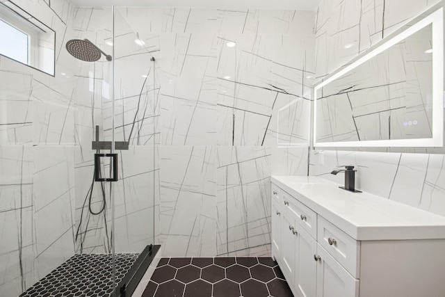 9 Pierce Ave Unit 2, Jersey City, NJ 07307 - full bath with a shower stall, vanity, tile walls, and tile patterned flooring