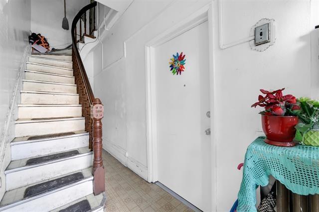 interior space with tile patterned floors