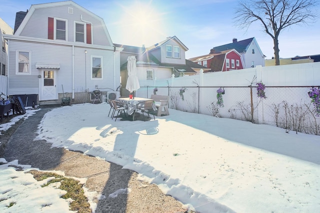 view of snow covered property