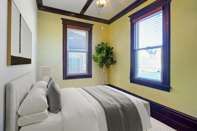 bedroom with crown molding and ceiling fan