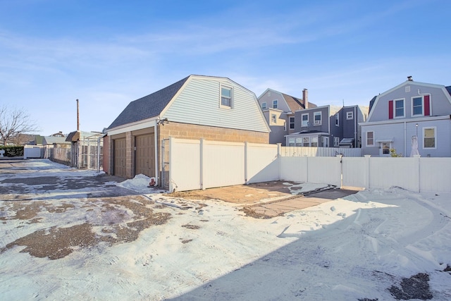 exterior space with a garage