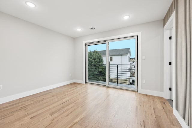 27 E 16th St, Bayonne, NJ 07002 - spare room with light wood-style floors, baseboards, and recessed lighting