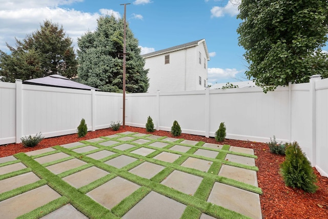 27 E 16th St, Bayonne, NJ 07002 - fenced backyard with a patio area