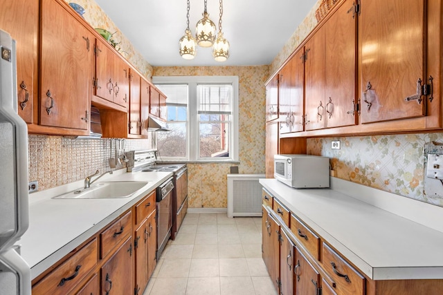 6 Kingswood Rd, Weehawken, NJ 07086 - kitchen with white appliances, wallpapered walls, a sink, light countertops, and brown cabinetry
