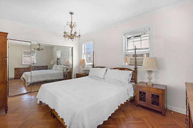 6 Kingswood Rd, Weehawken, NJ 07086 - bedroom with a chandelier, cooling unit, a closet, crown molding, and baseboards