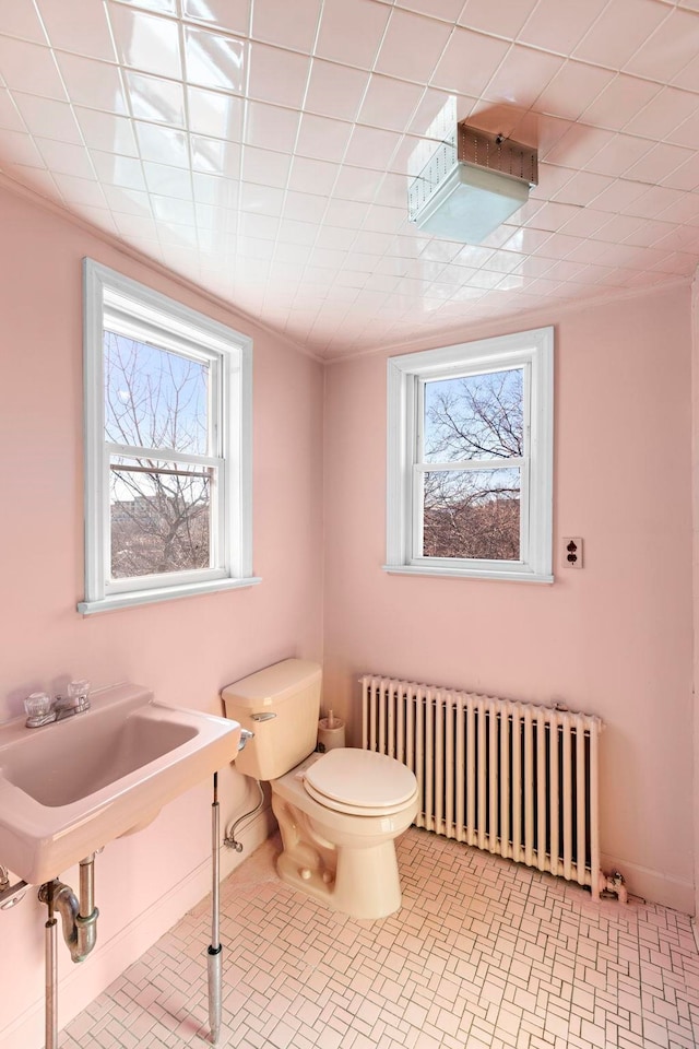 6 Kingswood Rd, Weehawken, NJ 07086 - bathroom with radiator heating unit, plenty of natural light, and toilet