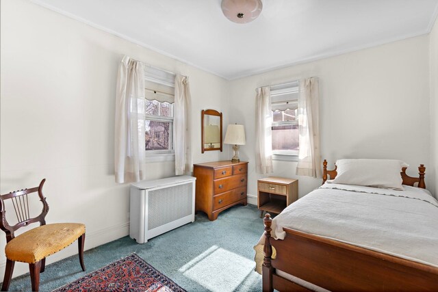 6 Kingswood Rd, Weehawken, NJ 07086 - carpeted bedroom featuring radiator, baseboards, and ornamental molding