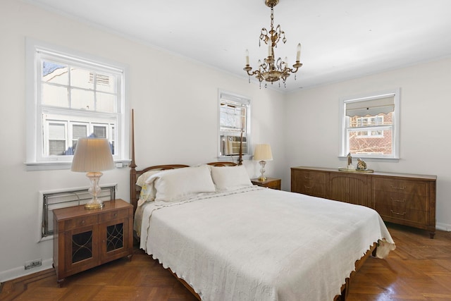 6 Kingswood Rd, Weehawken, NJ 07086 - bedroom featuring a chandelier, baseboards, and crown molding