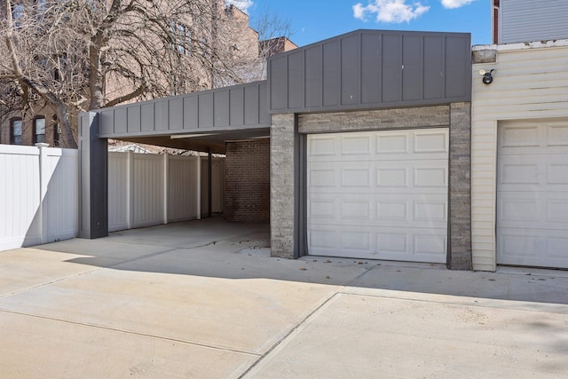 garage featuring fence