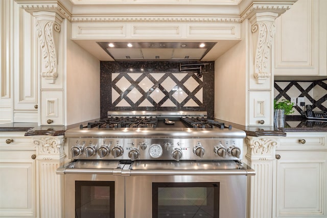 2 Euclid Rd, Fort Lee, NJ 07024 - kitchen featuring range with two ovens, cream cabinetry, and tasteful backsplash