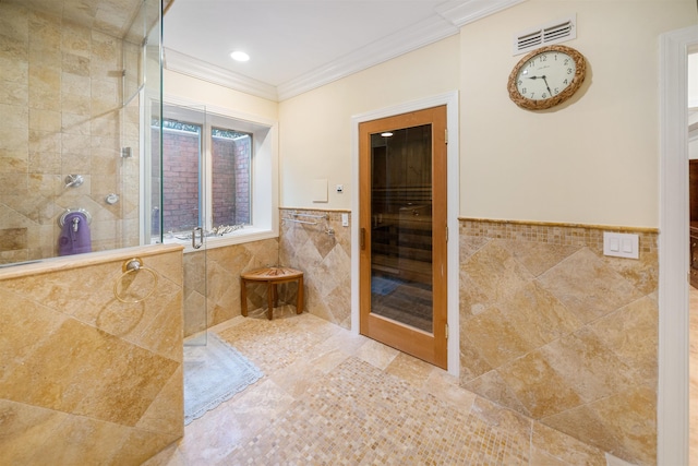 2 Euclid Rd, Fort Lee, NJ 07024 - full bathroom with tile walls, tiled shower, ornamental molding, tile patterned floors, and a wainscoted wall