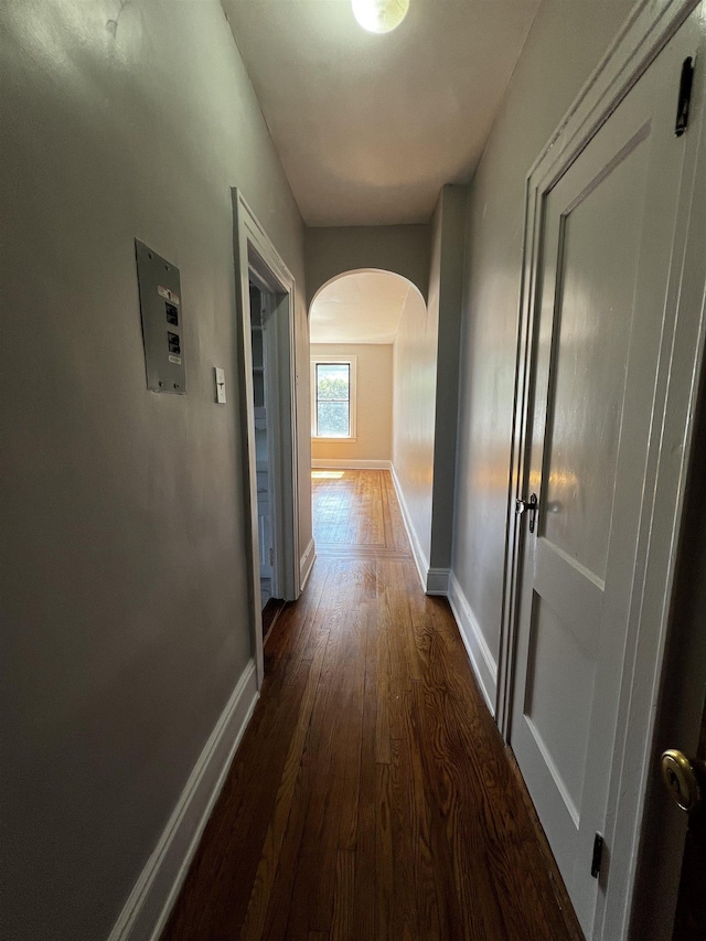 901 Grand Ave Unit B5, North Bergen, NJ 07047 - hallway featuring arched walkways, dark wood-style flooring, and baseboards