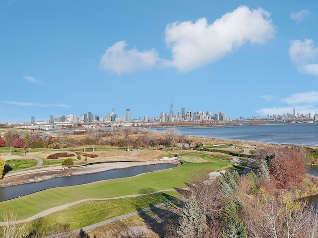 exterior space with a water view and a view of city