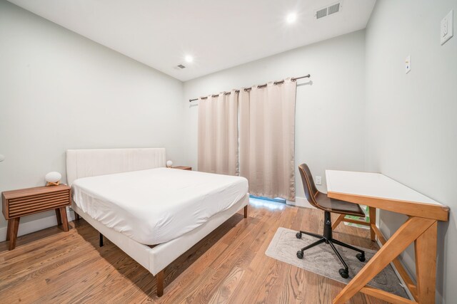 bedroom featuring light hardwood / wood-style floors