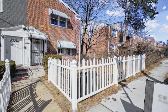 exterior space featuring a fenced front yard