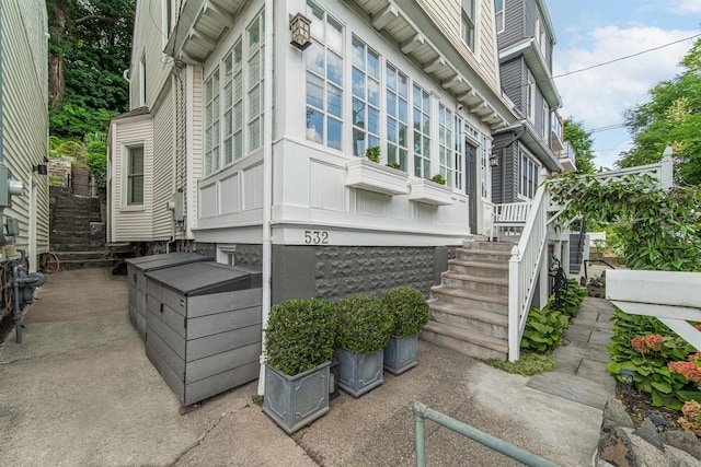 view of home's exterior with stairs