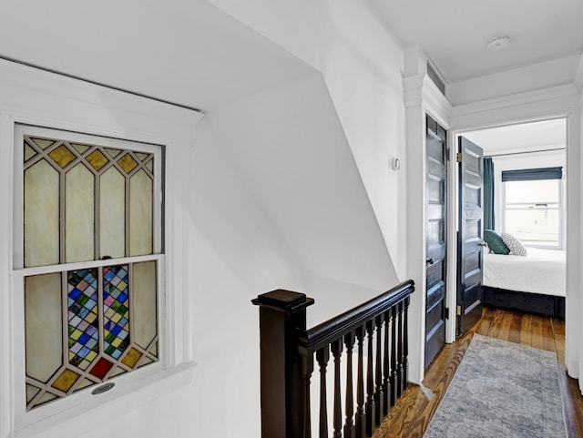 hall with dark wood-style floors