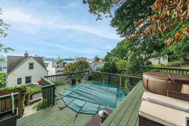 deck with a hot tub