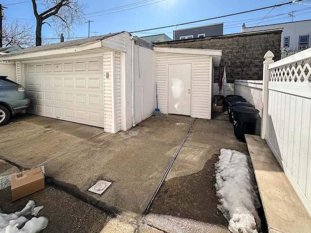 detached garage with fence