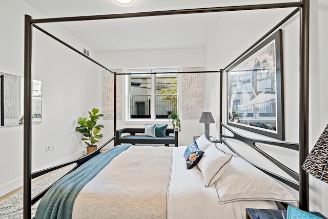 bedroom featuring hardwood / wood-style floors