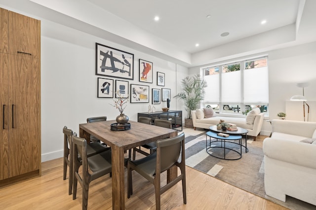 dining space featuring light hardwood / wood-style floors