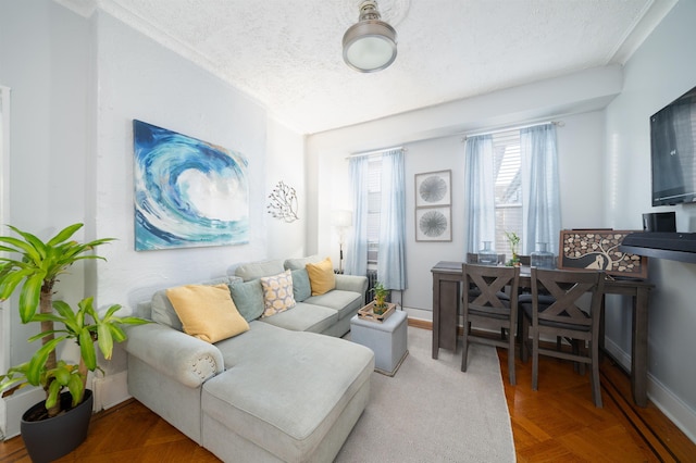 living room featuring parquet floors and a textured ceiling