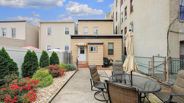 back of house featuring a patio