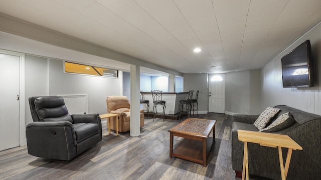 living room featuring dark hardwood / wood-style flooring