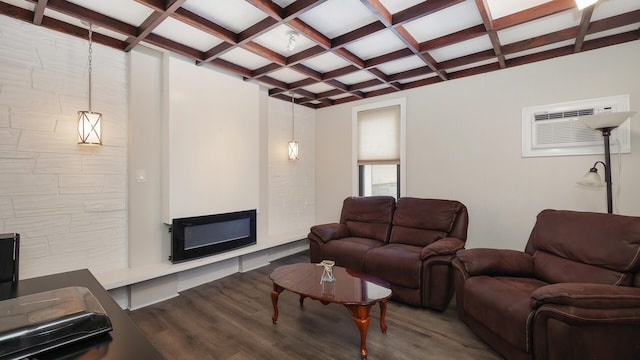 living room with hardwood / wood-style floors, a wall unit AC, beam ceiling, and coffered ceiling