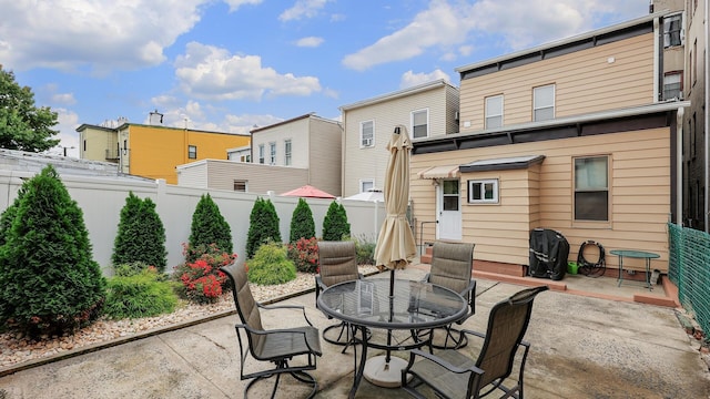 rear view of house with a patio area