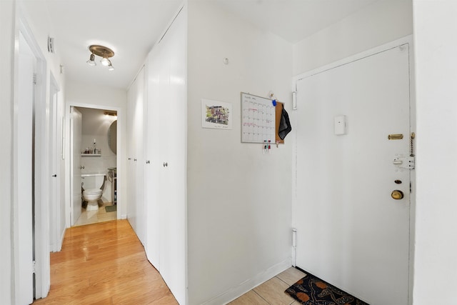 hall with light wood finished floors